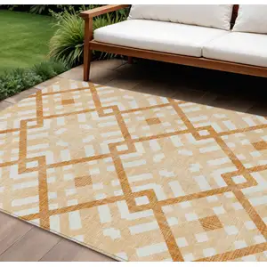 Photo of Peach Orange And Ivory Geometric Washable Indoor Outdoor Area Rug