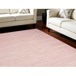 Photo of Pink Abstract Washable Area Rug