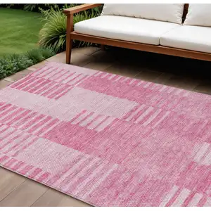 Photo of Pink And Blush Striped Washable Indoor Outdoor Area Rug