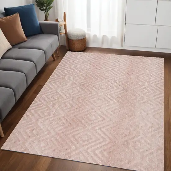 Pink And Ivory Geometric Stain Resistant Area Rug Photo 1