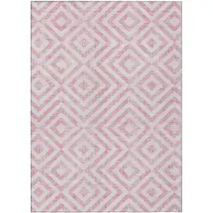 Photo of Pink And Ivory Geometric Washable Indoor Outdoor Area Rug