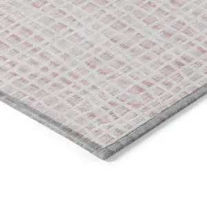 Photo of Pink And Ivory Striped Washable Indoor Outdoor Area Rug