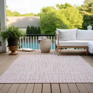 Photo of Pink And Ivory Striped Washable Indoor Outdoor Area Rug