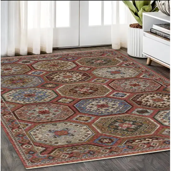 Pink And Red Medallion Area Rug With Fringe Photo 1