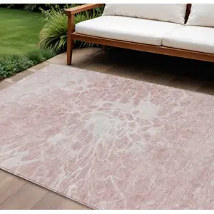 Photo of Pink Blush And Ivory Abstract Washable Indoor Outdoor Area Rug