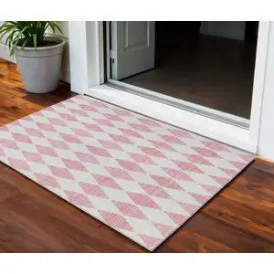 Photo of Pink Geometric Washable Indoor Outdoor Area Rug