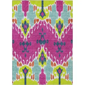 Photo of Pink Lime Green And Orange Ikat Washable Indoor Outdoor Area Rug