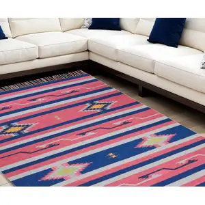 Photo of Pink and Blue Southwestern Handmade Area Rug With Fringe