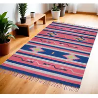 Photo of Pink and Blue Southwestern Handmade Area Rug With Fringe