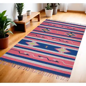 Photo of Pink and Blue Southwestern Handmade Area Rug With Fringe