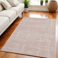 Photo of Pink and Ivory Abstract Geometric Area Rug