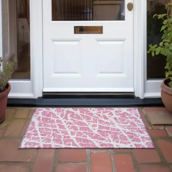 Pink and Ivory Abstract Washable Non Skid Indoor Outdoor Area Rug Photo 9