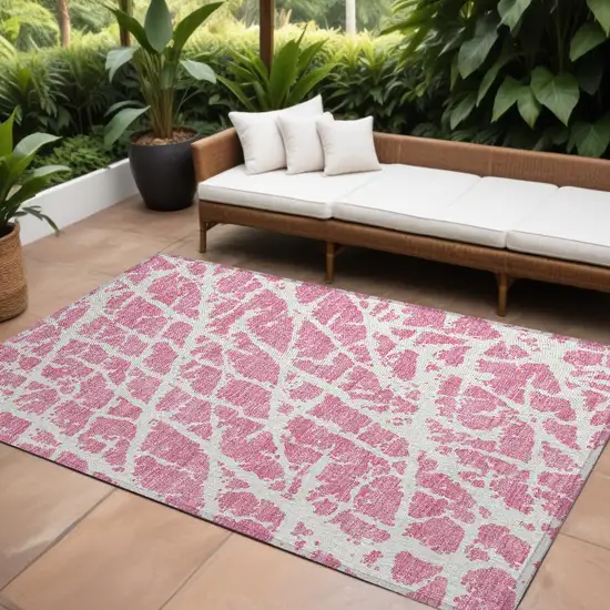 Pink and Ivory Abstract Washable Non Skid Indoor Outdoor Area Rug Photo 1