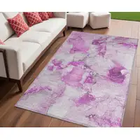 Photo of Pink and Ivory Abstract Washable Non Skid Indoor Outdoor Area Rug