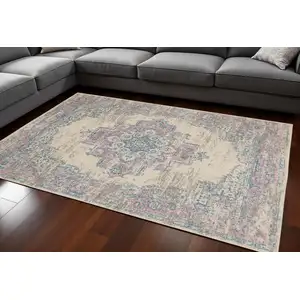 Photo of Pink and Ivory Medallion Power Loom Area Rug