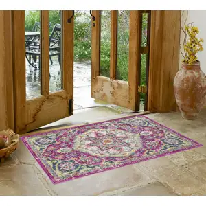 Photo of Pink and Ivory Medallion Scatter Rug