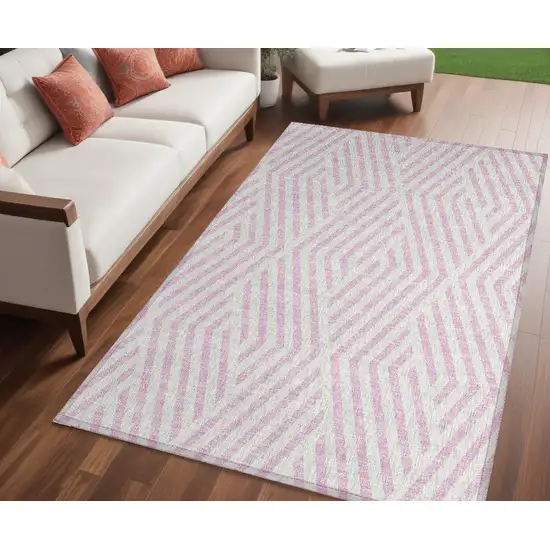 Pink and White Geometric Washable Non Skid Indoor Outdoor Area Rug Photo 1