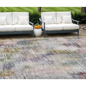 Photo of Plum Purple And Ivory Abstract Washable Indoor Outdoor Area Rug