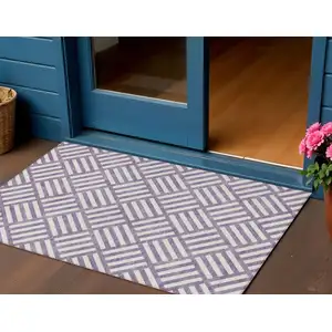 Photo of Purple And Ivory Geometric Washable Indoor Outdoor Area Rug