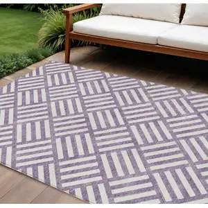 Photo of Purple And Ivory Geometric Washable Indoor Outdoor Area Rug