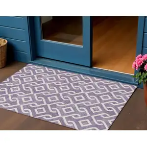 Photo of Purple And Ivory Geometric Washable Indoor Outdoor Area Rug