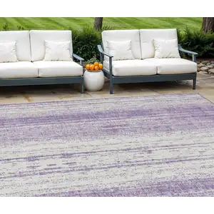 Photo of Purple And Ivory Striped Washable Indoor Outdoor Area Rug