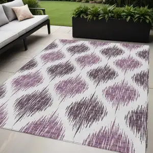 Photo of Purple Plum And Ivory Ikat Washable Indoor Outdoor Area Rug