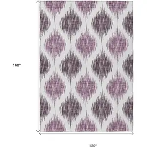 Photo of Purple Plum And Ivory Ikat Washable Indoor Outdoor Area Rug