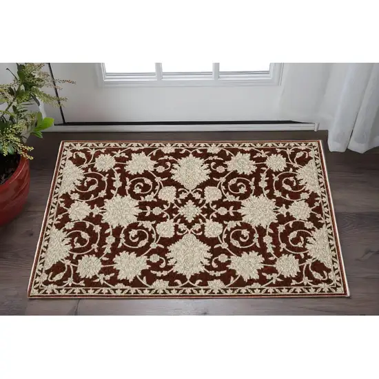 Red And Beige Floral Area Rug With Fringe Photo 1