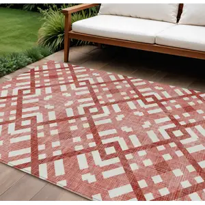 Photo of Red And Ivory Geometric Washable Indoor Outdoor Area Rug