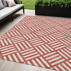 Photo of Red And Ivory Geometric Washable Indoor Outdoor Area Rug