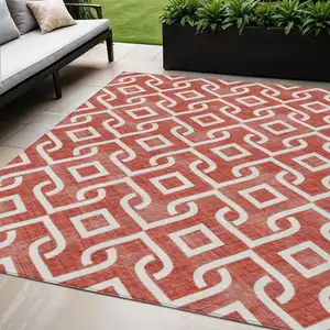 Photo of Red And Ivory Geometric Washable Indoor Outdoor Area Rug