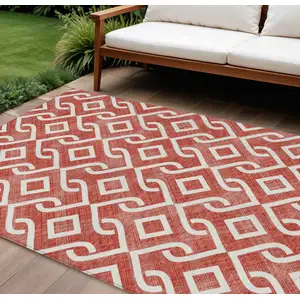 Photo of Red And Ivory Geometric Washable Indoor Outdoor Area Rug