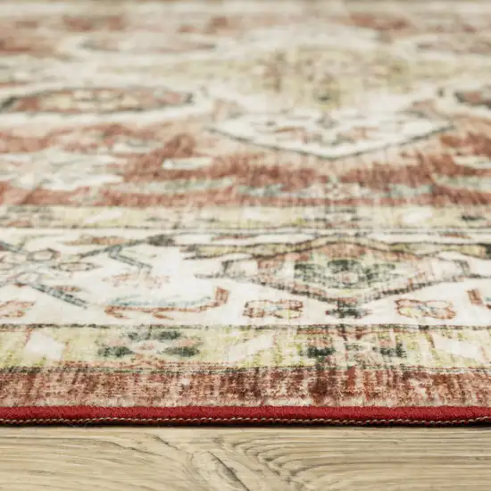 Red And Ivory Oriental Distressed Area Rug Photo 5