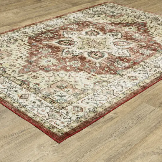 Red And Ivory Oriental Distressed Area Rug Photo 9