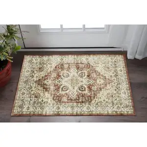 Photo of Red And Ivory Oriental Distressed Area Rug