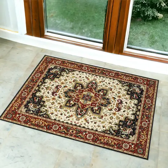 Red and Ivory Oriental Power Loom Area Rug Photo 1