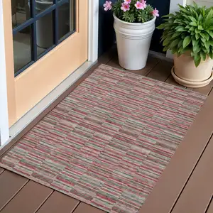 Photo of Red Beige And Copper Striped Washable Indoor Outdoor Area Rug