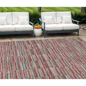 Photo of Red Beige And Copper Striped Washable Indoor Outdoor Area Rug