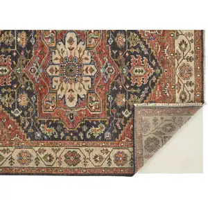 Photo of Red Black And Ivory Wool Floral Hand Knotted Stain Resistant Area Rug