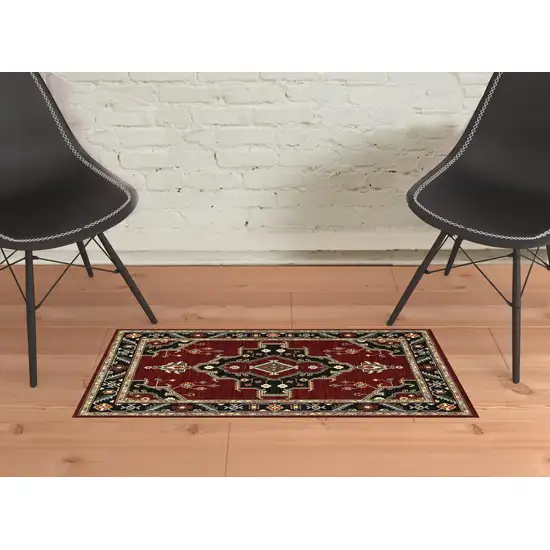 Red Black Beige And Blue Oriental Power Loom Stain Resistant Area Rug With Fringe Photo 3