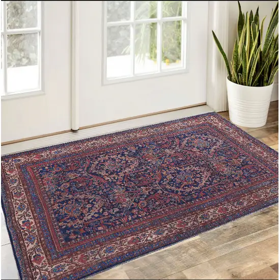 Red Blue And Tan Floral Power Loom Area Rug Photo 1