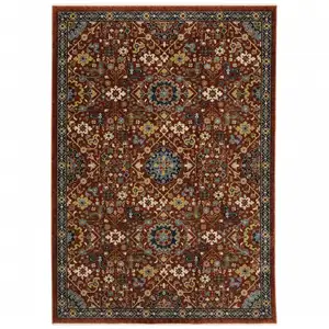 Photo of Red Blue Gold And Ivory Oriental Power Loom Stain Resistant Area Rug With Fringe