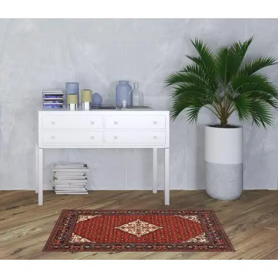 Red Blue Ivory And Orange Oriental Power Loom Stain Resistant Area Rug With Fringe Photo 4