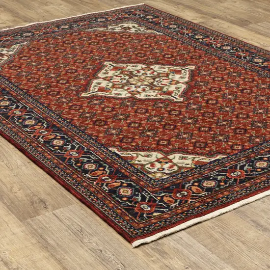 Red Blue Ivory And Orange Oriental Power Loom Stain Resistant Area Rug With Fringe Photo 9