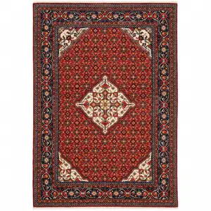 Photo of Red Blue Ivory And Orange Oriental Power Loom Stain Resistant Area Rug With Fringe