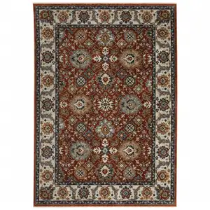 Photo of Red Blue Ivory Gold And Navy Oriental Power Loom Stain Resistant Area Rug With Fringe