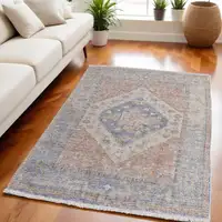 Photo of Red Blue and Ivory Abstract Hand Woven Distressed Area Rug With Fringe