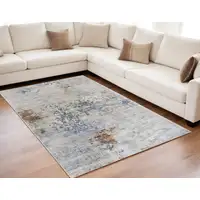 Photo of Red Blue and Ivory Abstract Power Loom Area Rug