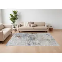 Photo of Red Blue and Ivory Abstract Power Loom Area Rug